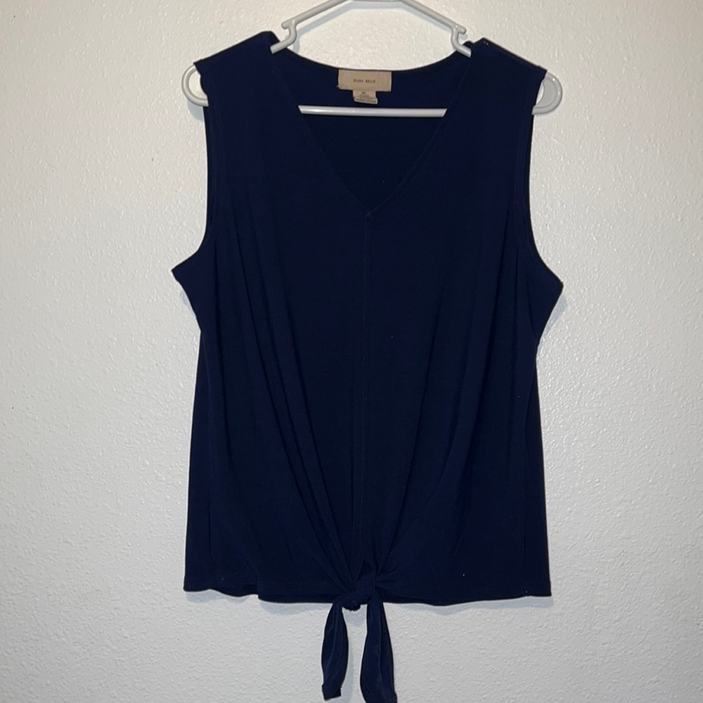 Women's sleeveless v-neck blouse with a tie front